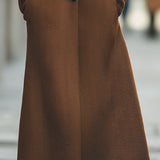 Elegantní kabát se vzorem rybí kosti