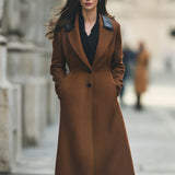 Elegantní kabát se vzorem rybí kosti