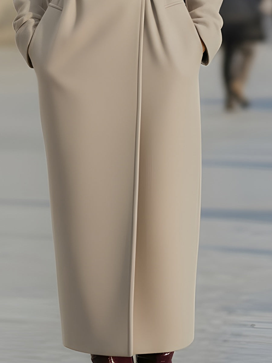 Elegantni bež vuneni trench kaput s pojasom