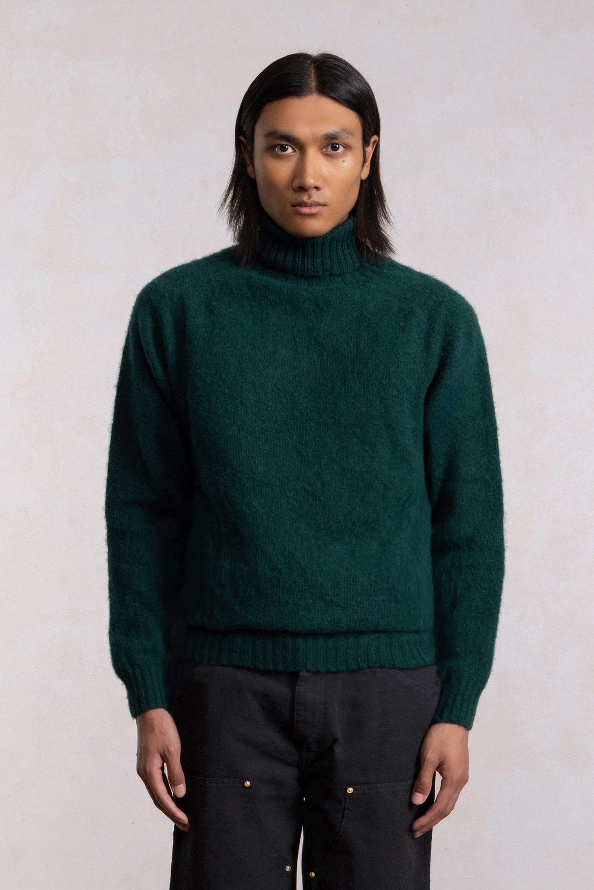 Tamnozelena vuna pulover