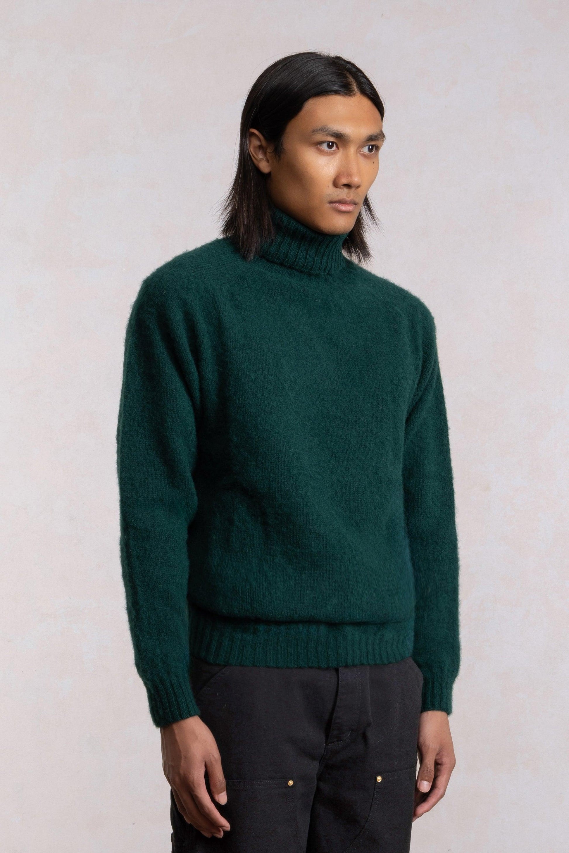 Tamnozelena vuna pulover