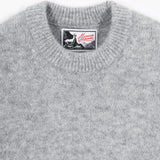 Šedý svetr z alpaky