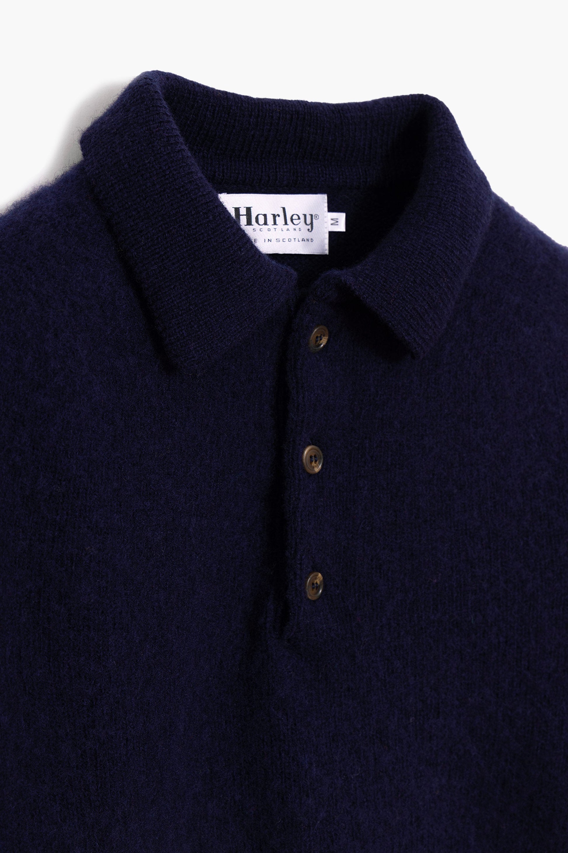 Tamno plavi pulover s polo